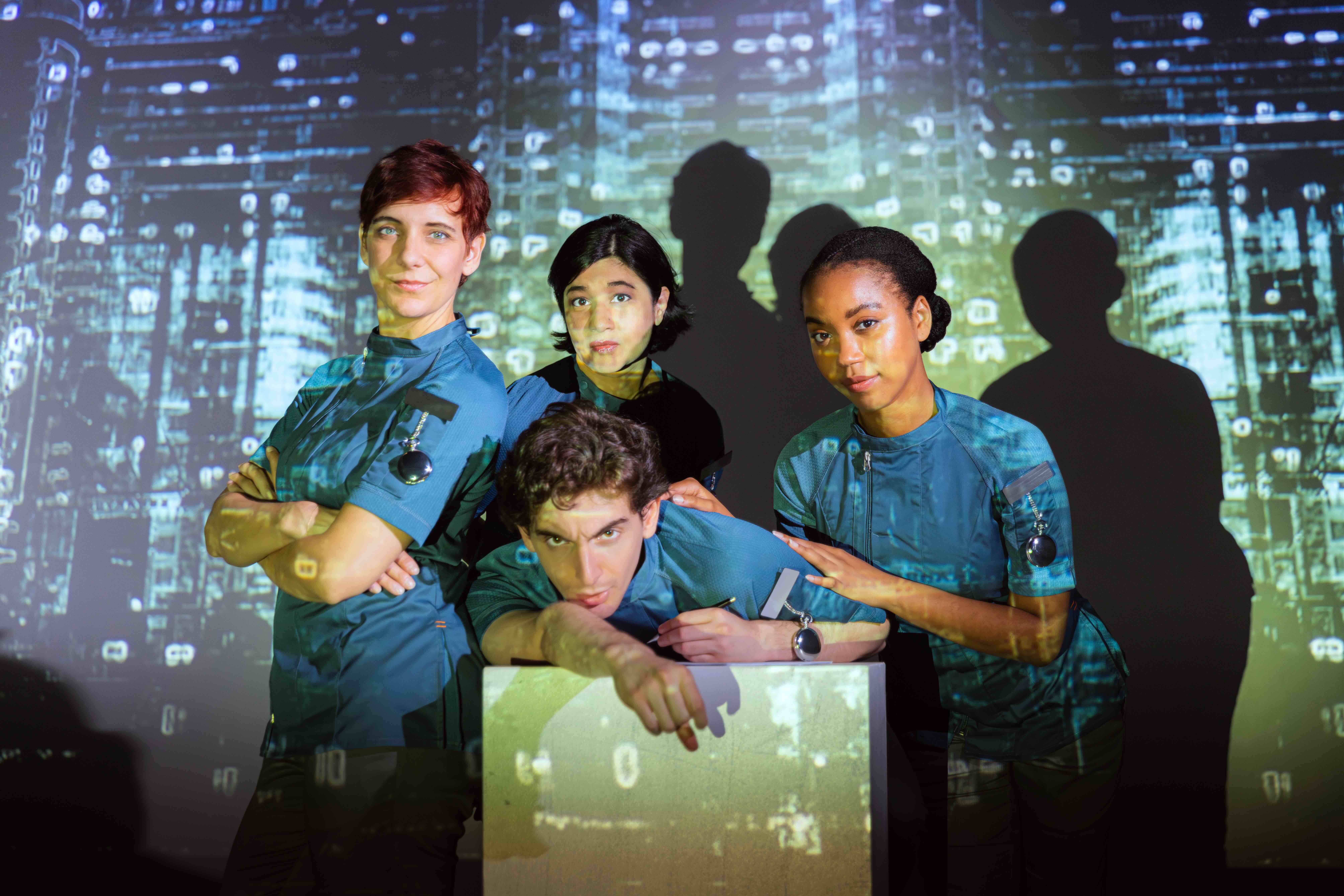  Sabra Shelly as I-330, Sangita Baruah as U, Cassandra Umaña as O-90 and Aaron Greenberg as D-503. 