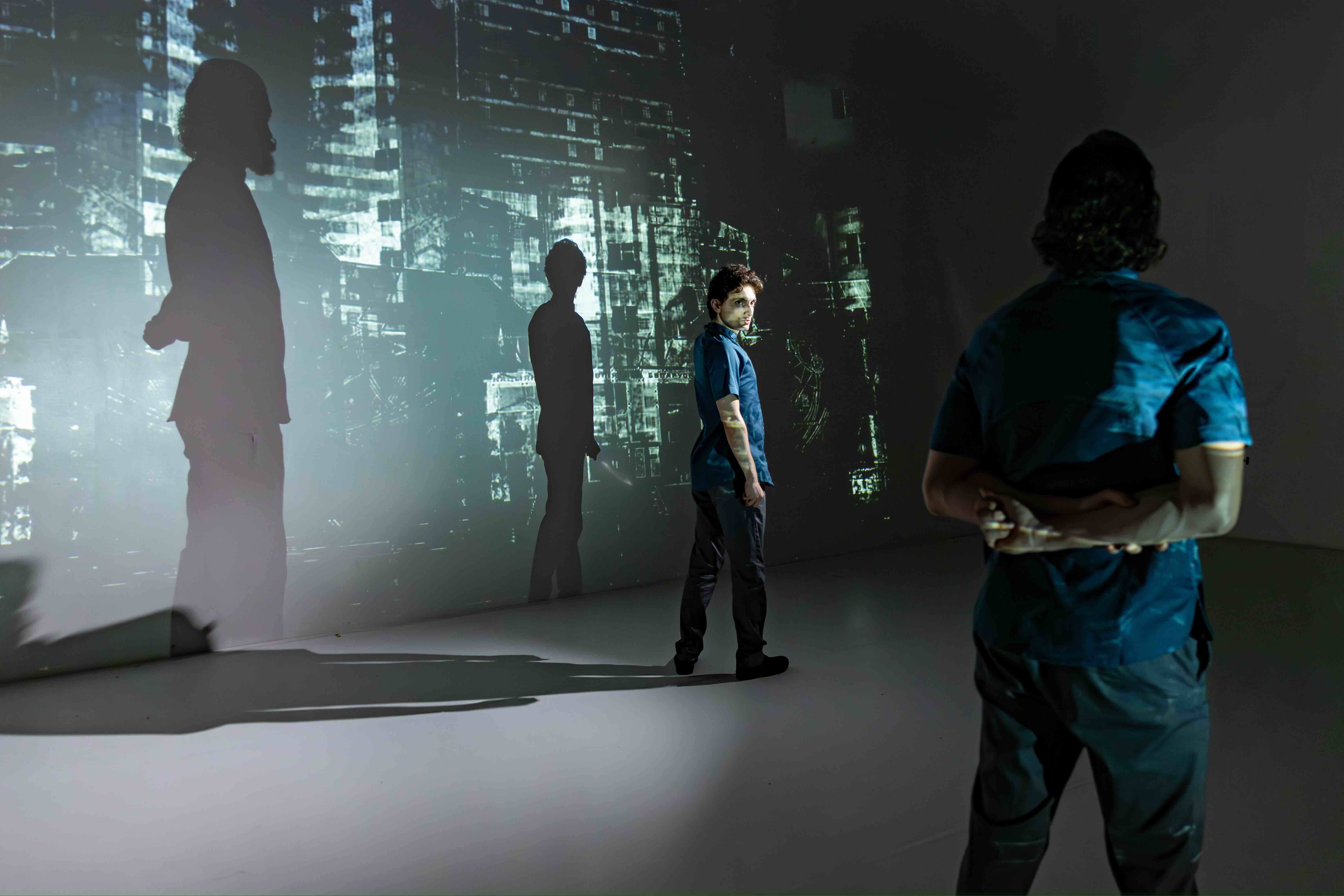  Aaron Greenberg as D-503 and Ian Cramer as S-4711. 