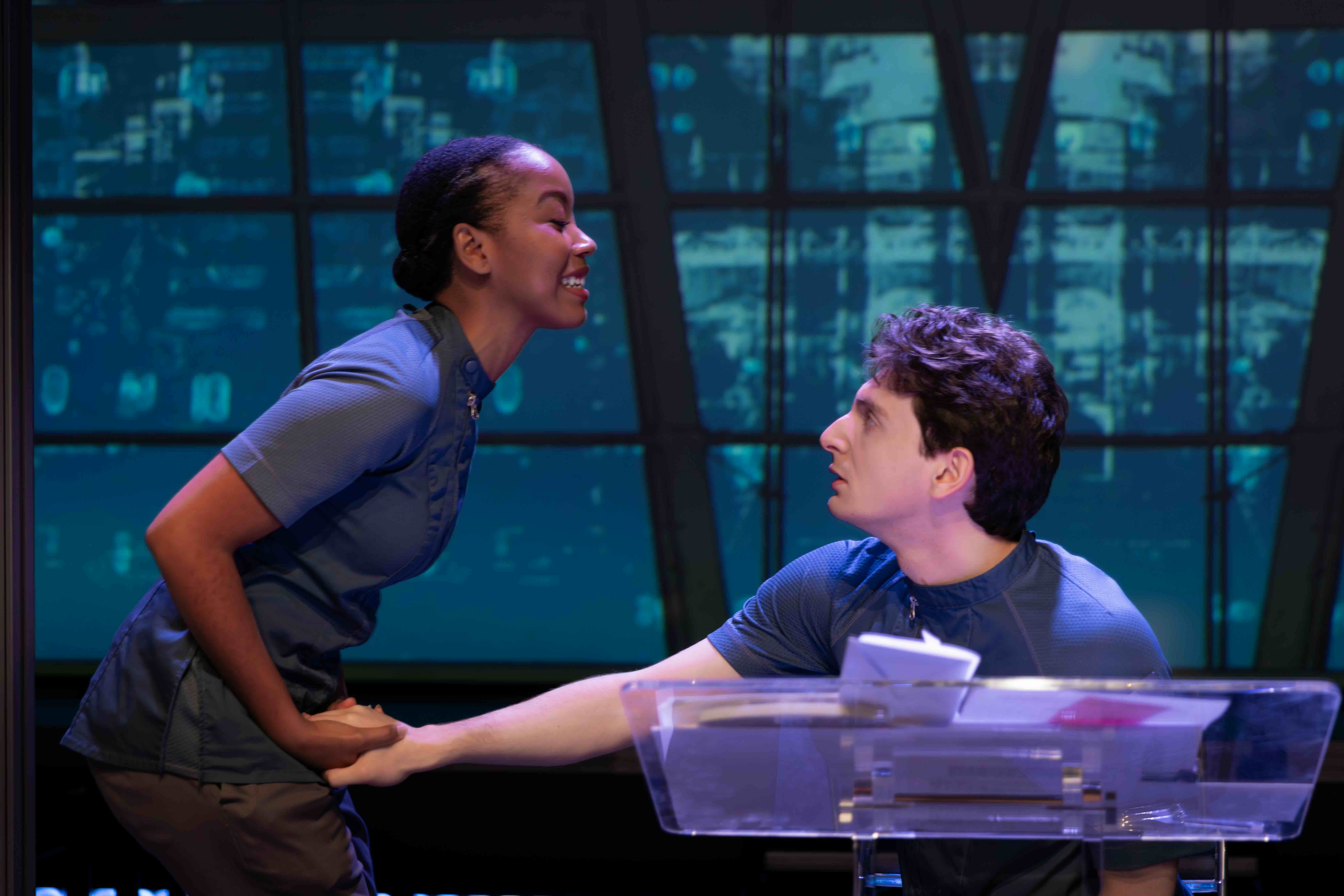  Cassandra Umaña as O-90 and Aaron Greenberg as D-503. 