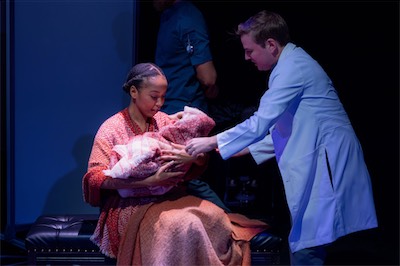 Cassandra Umaña as O-90 and John Teresi as Doctor